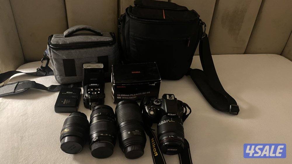Nikon D5100/عدسات 5/ عدسه جديده لم تستخدم/  فلاش كبير\ بطاريتين\ 2bag4