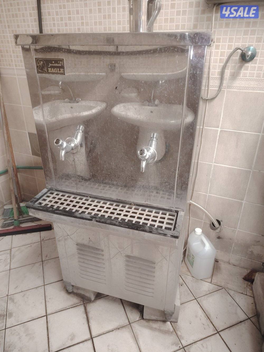 برادة مياه ماركة النسر المعروفه تعمل بشكل جيد شبه جديده ٢ حنفيه0