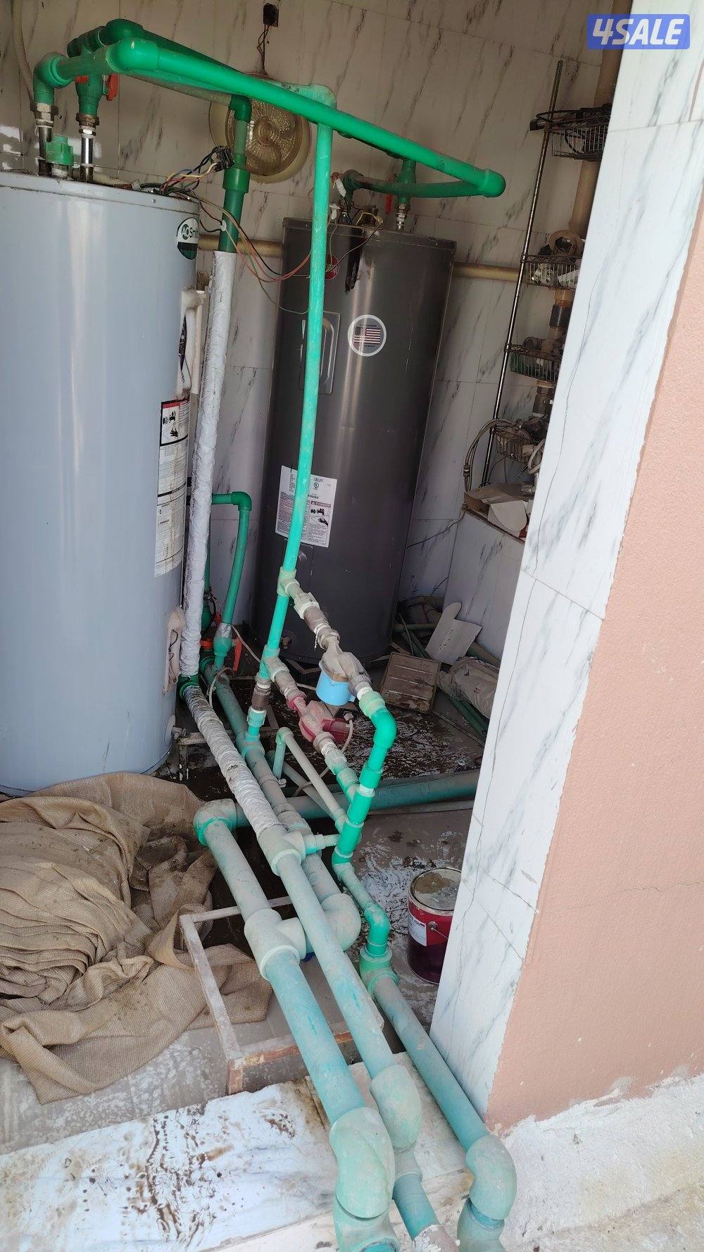 فني سخانات مركزيه وعاديه ومضات الدفع والصرف والراجع والفلاتر2