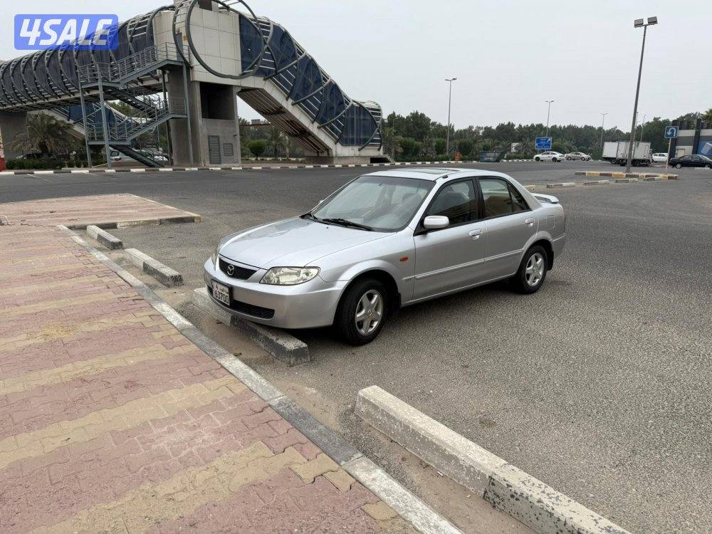 مازدا 323 سنة 2003 عداد 140 ألف بحالة جيدة و السعر قابل للنقاش0