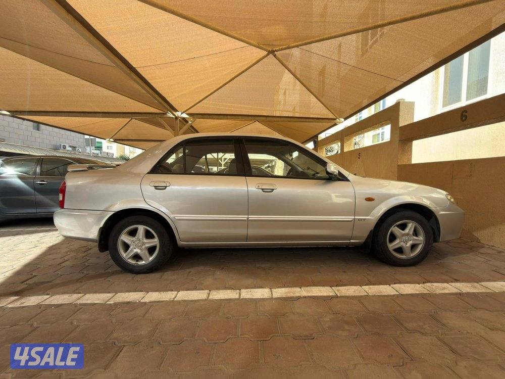 مازدا 323 سنة 2003 عداد 140 ألف بحالة جيدة و السعر قابل للنقاش2