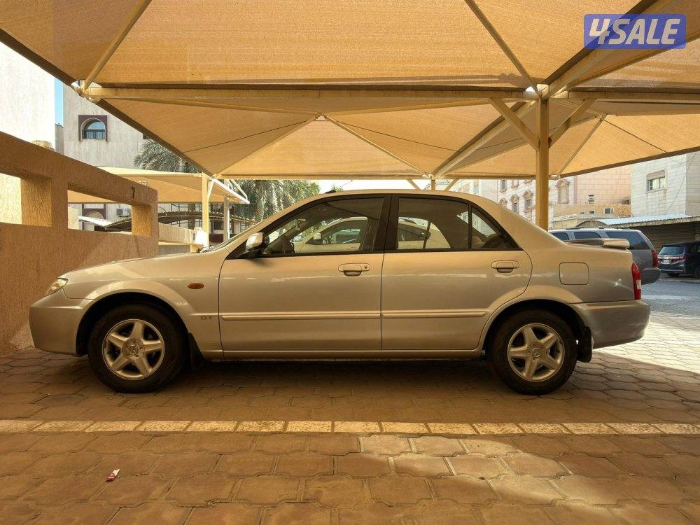 مازدا 323 سنة 2003 عداد 140 ألف بحالة جيدة و السعر قابل للنقاش1