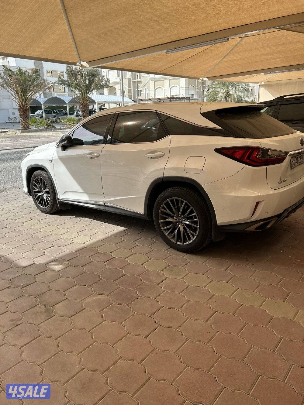 لكزس rx موديل ٢٠١٦ لون ابيض داخل احمر f.sport ماشي 212 شرط الفحص0