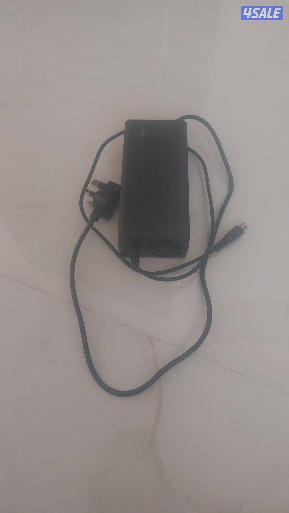 شاحن سكوتر الكتروني جديد لم يستخدم الا مرة واحدة فقط0