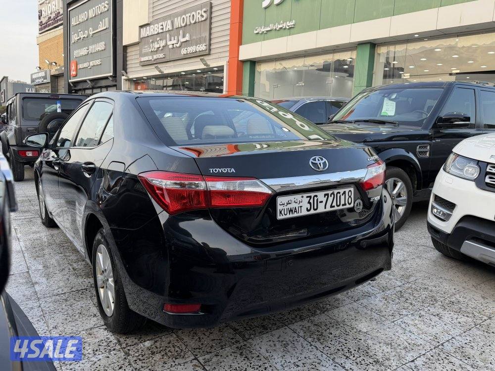 كورلا صبغ الوكاله موديل 2015 كامل المواصفات عداد قليل بحالة الوكاله4