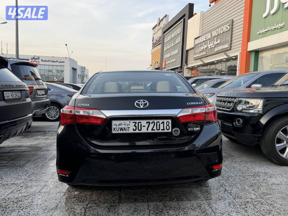 كورلا صبغ الوكاله موديل 2015 كامل المواصفات عداد قليل بحالة الوكاله5