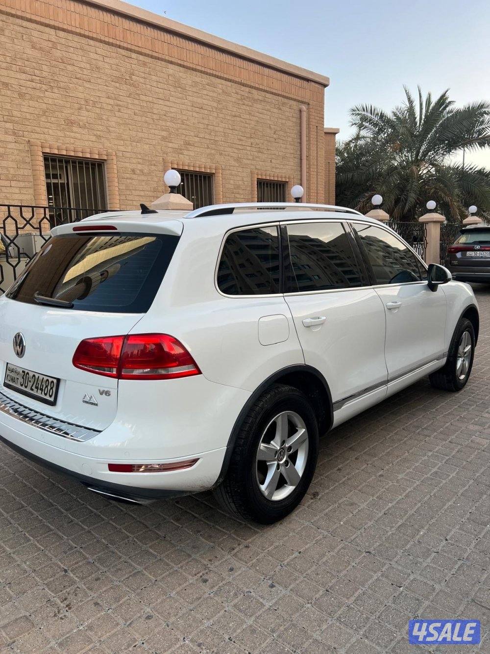 طوارق 2014 لون ابيض1