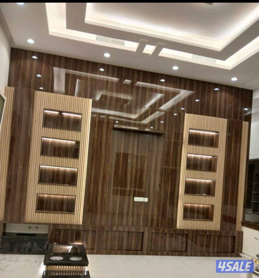 ابونور لعمل جميع الديكورات الخشبية وورق الجدران وبديل الحجر وبديل الرخ0