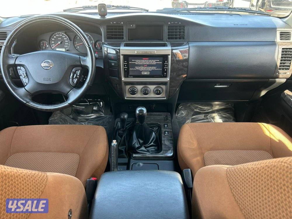 نيسان باترول سوبر سفارى موديل 2023 ماشى 65.000 k.m  وارد البابطين6