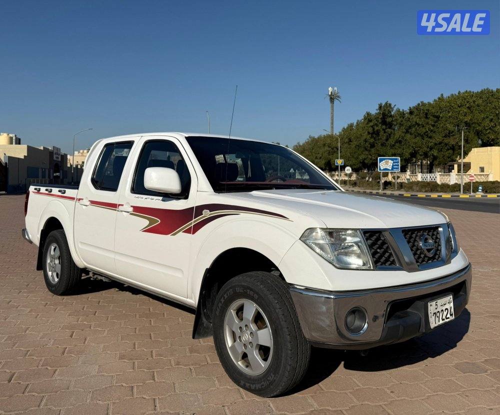 قمة بالنظافة وانيت نيسان نافارا 2010 قير اتوماتيك البابطين صبغ الوكالة0