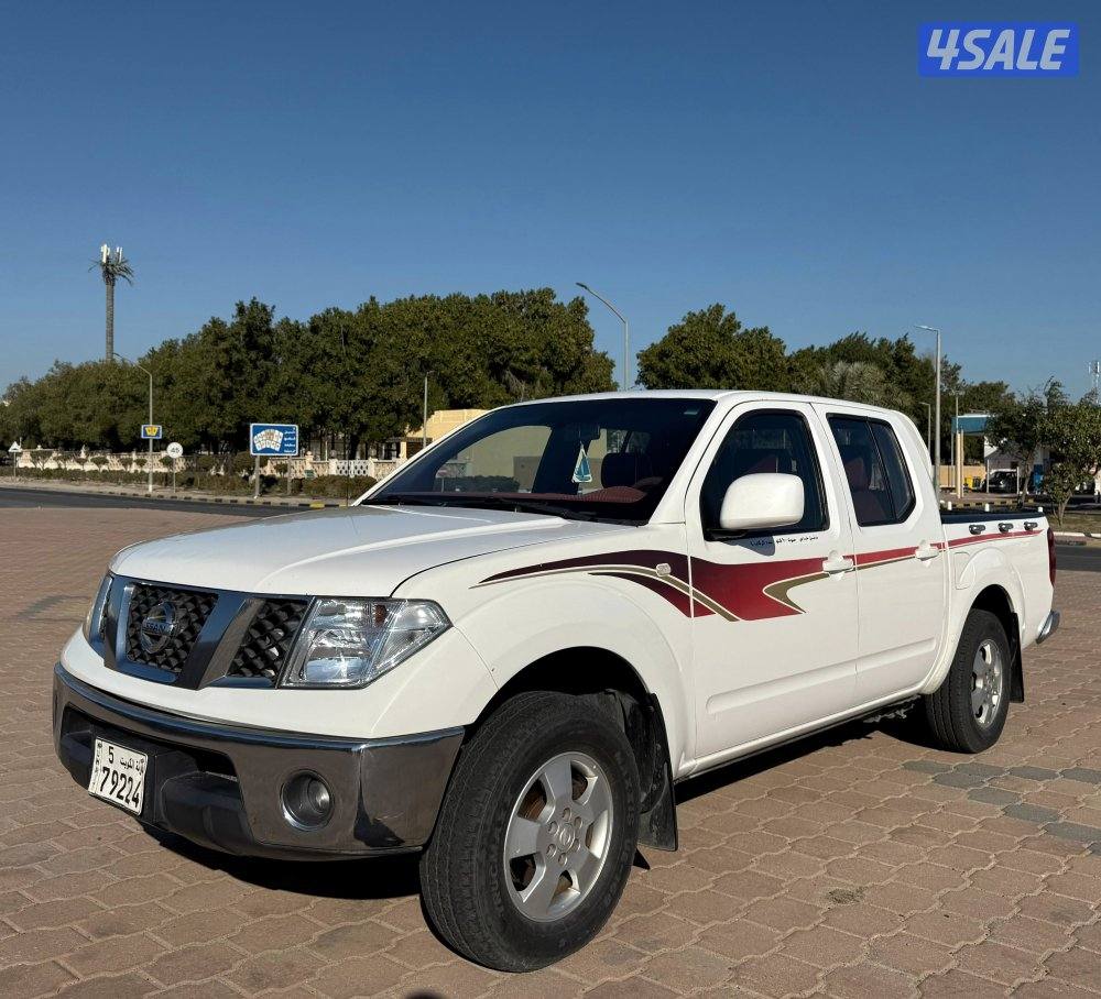 قمة بالنظافة وانيت نيسان نافارا 2010 قير اتوماتيك البابطين صبغ الوكالة1