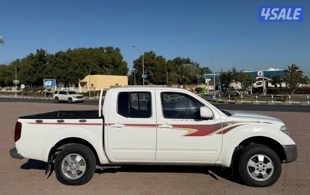 قمة بالنظافة وانيت نيسان نافارا 2010 قير اتوماتيك البابطين صبغ الوكالة4