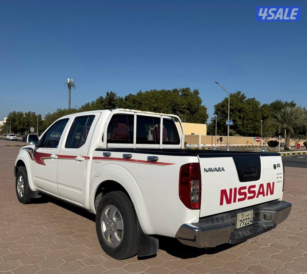 قمة بالنظافة وانيت نيسان نافارا 2010 قير اتوماتيك البابطين صبغ الوكالة6