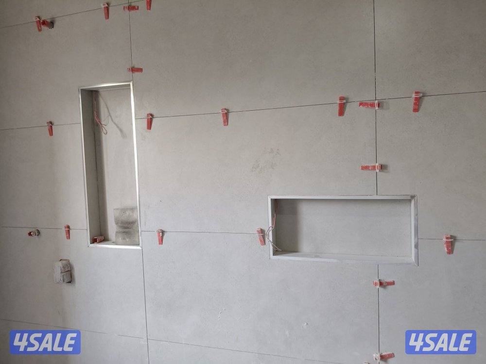 ابو محمد للمقاولات سراميك بورسلان ورخام وكاشه وتكسير حمامات وتمديد صحي1