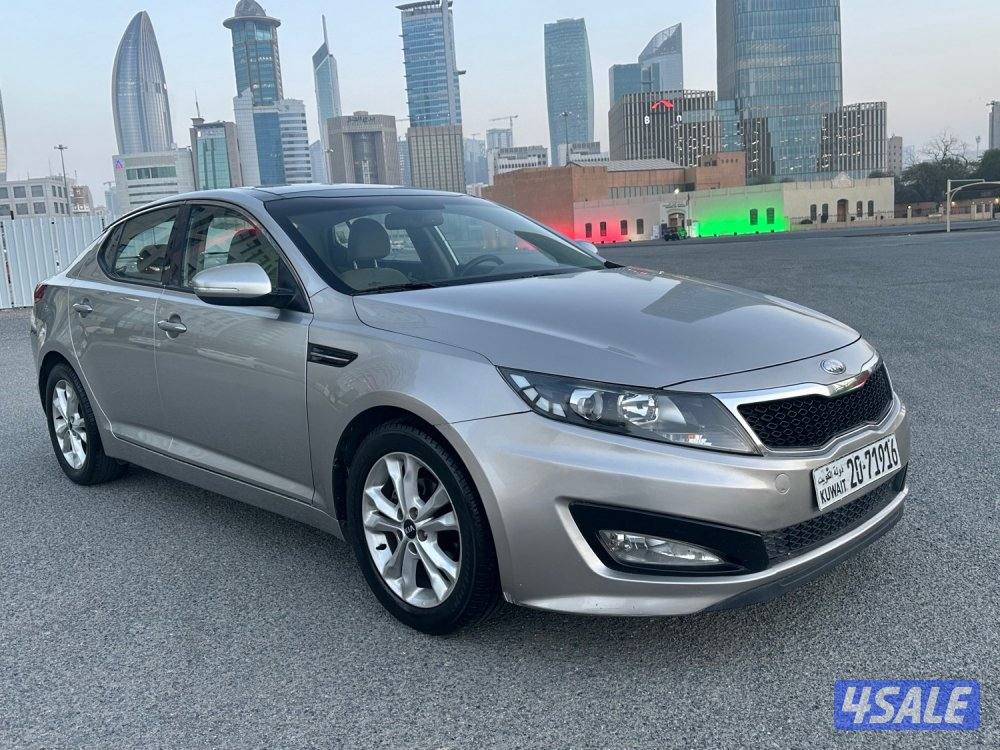 كيا اوبتيما_موديل 2013_صبغ الوكالة_ مرفق الفحص_عداد 67 Km فقط0