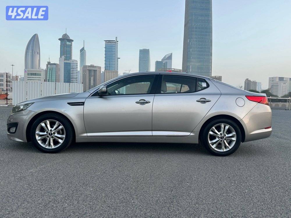 كيا اوبتيما_موديل 2013_صبغ الوكالة_ مرفق الفحص_عداد 67 Km فقط2