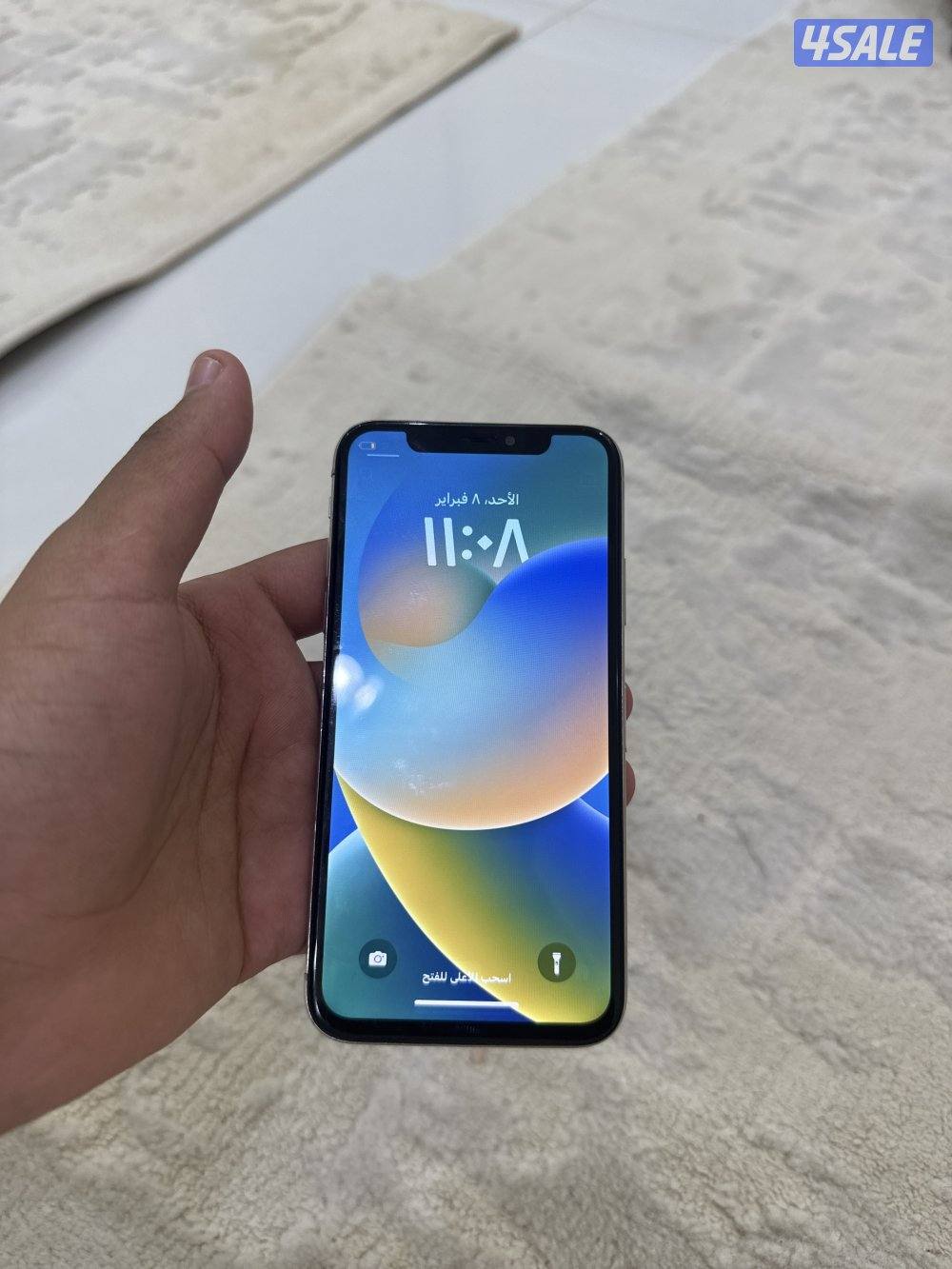 ايفون X للبيع كسر من ورا  وقاعده الشحن خربانه0