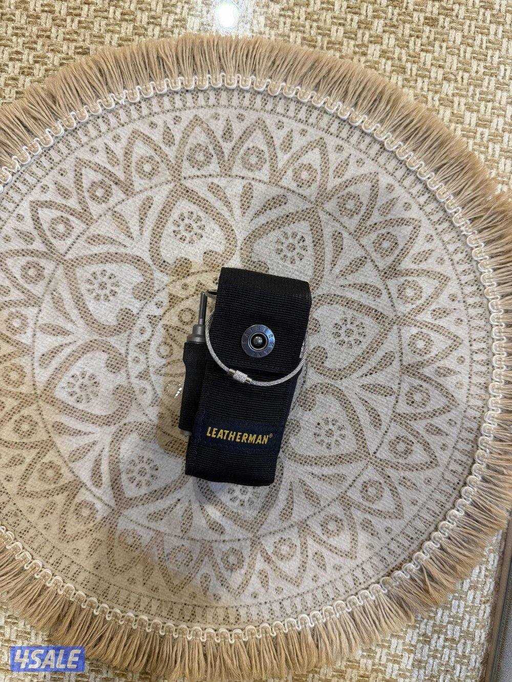 مثل اللي بالصور موضح كل الاغراض مافيها شيLEATHERMAN        SURGEللبيع2