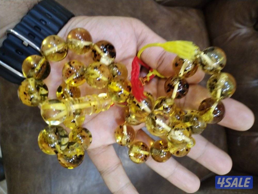 كهرمان قديم بشوائب طبيعية – فحص يدوي0