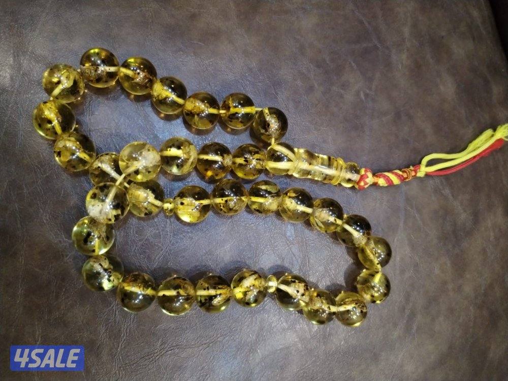 كهرمان قديم بشوائب طبيعية – فحص يدوي2