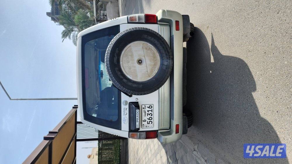 للبيع جيب تويوتا برادو موديل 2001 لون ابيض بحالة جيدة جدا (لأعلى سعر)0