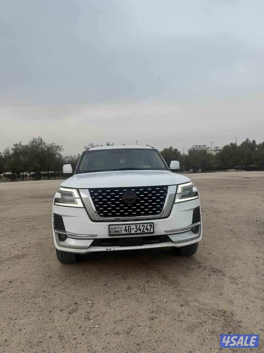 باترول ٣٢٠ ابيض مطفي مسجل بدفتر - بيمه سنه0