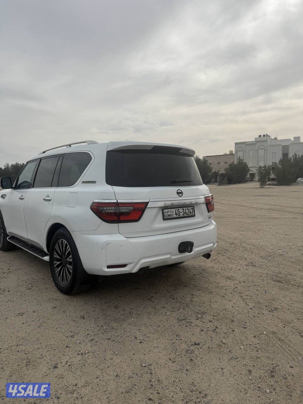 باترول ٣٢٠ ابيض مطفي مسجل بدفتر - بيمه سنه2