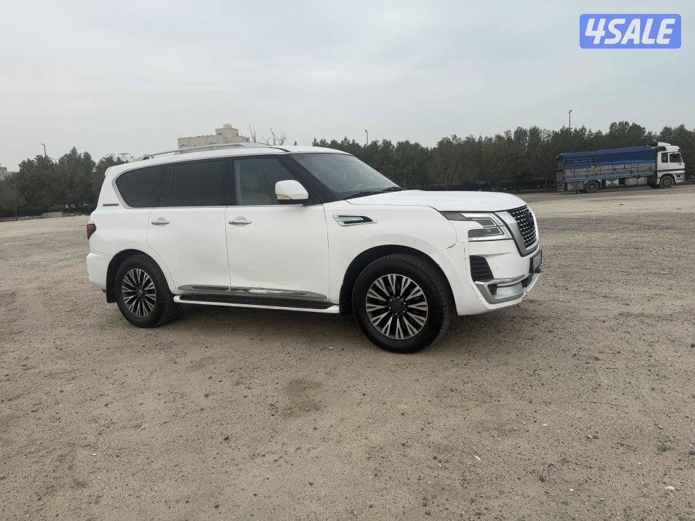 باترول ٣٢٠ ابيض مطفي مسجل بدفتر - بيمه سنه4