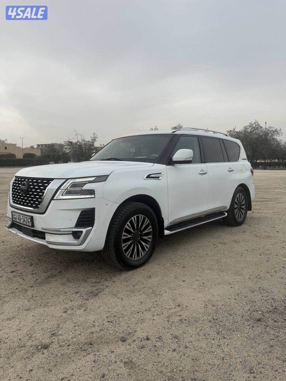 باترول ٣٢٠ ابيض مطفي مسجل بدفتر - بيمه سنه7