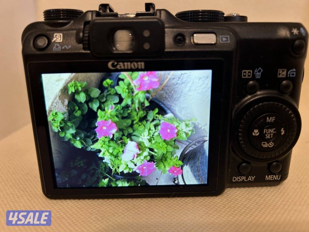 Camera canon G9 نادره شبه جديده صورها داخل2