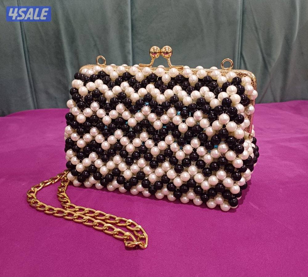 شنطه من اللولى شيك وعصريه مناسبه للحفلات والأعياد وجميع المناسبات0