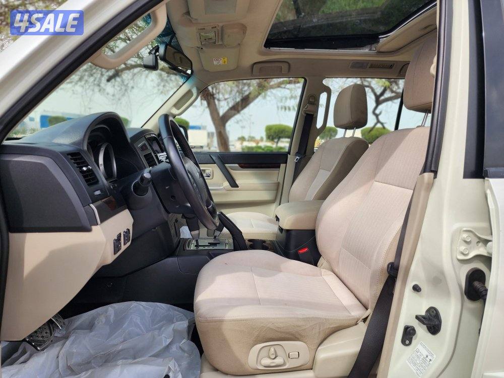 للبيع باجيرو موديل 2022 فتحة و ثلاجة عداد 137 ألف سرفس منتظم شرط الفحص4