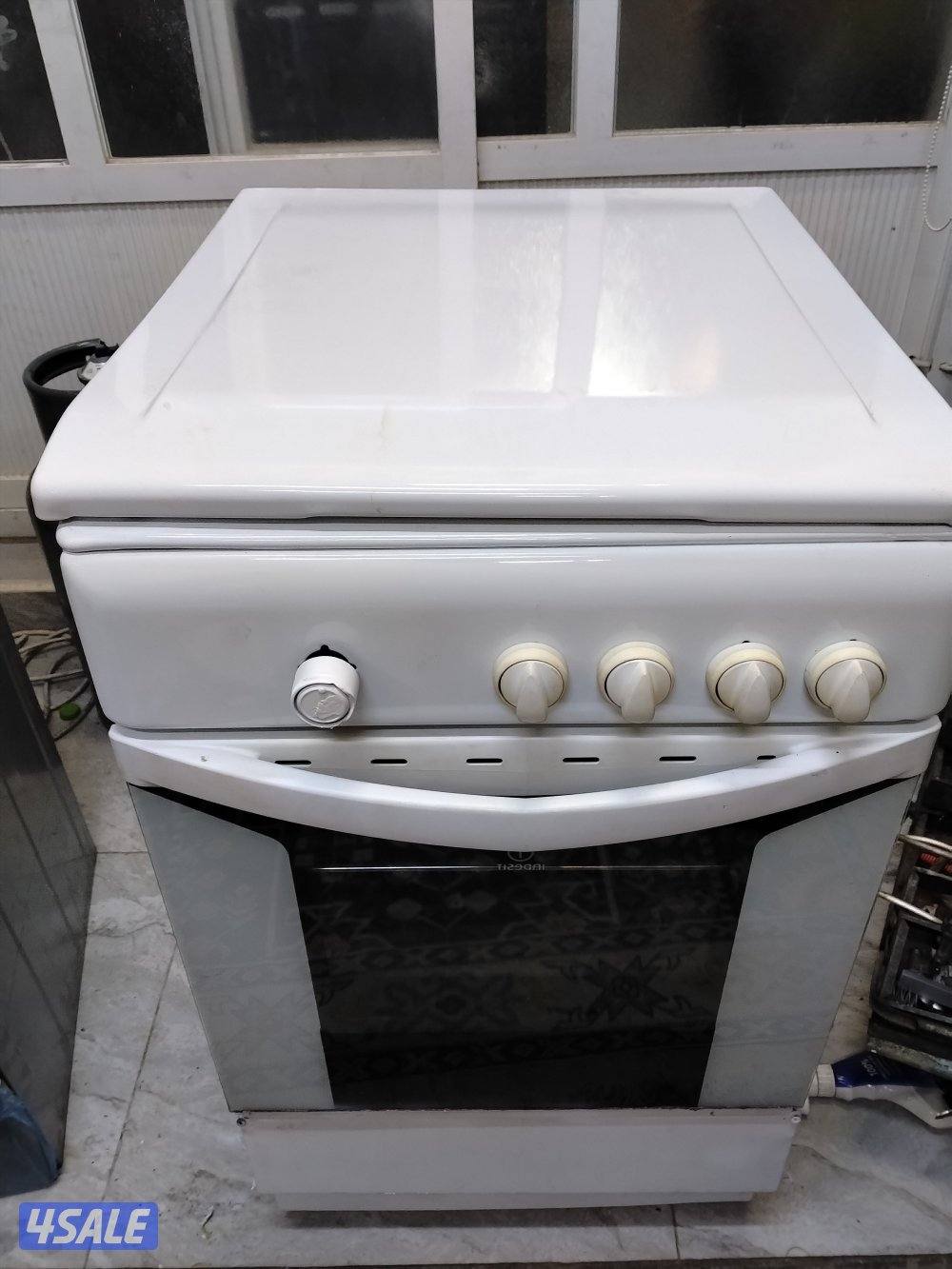 انديست إيطالي 4 عيون نار زرقا باب محكم غطاء صاج شرط الفحص ونظافة الجدي1