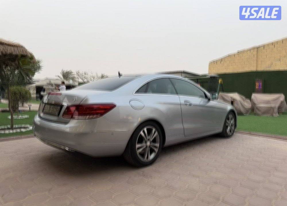 مرسيدس es250 كوبي سيلفر موديل 2014 ماشي 190 الف نظيفه السياره3
