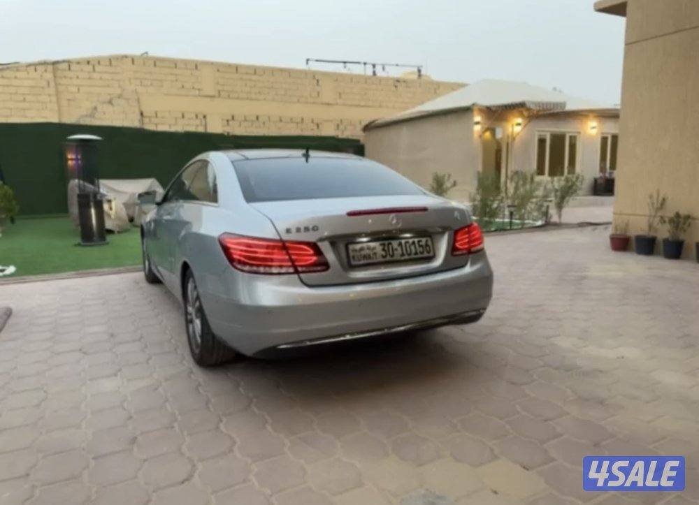 مرسيدس es250 كوبي سيلفر موديل 2014 ماشي 190 الف نظيفه السياره11
