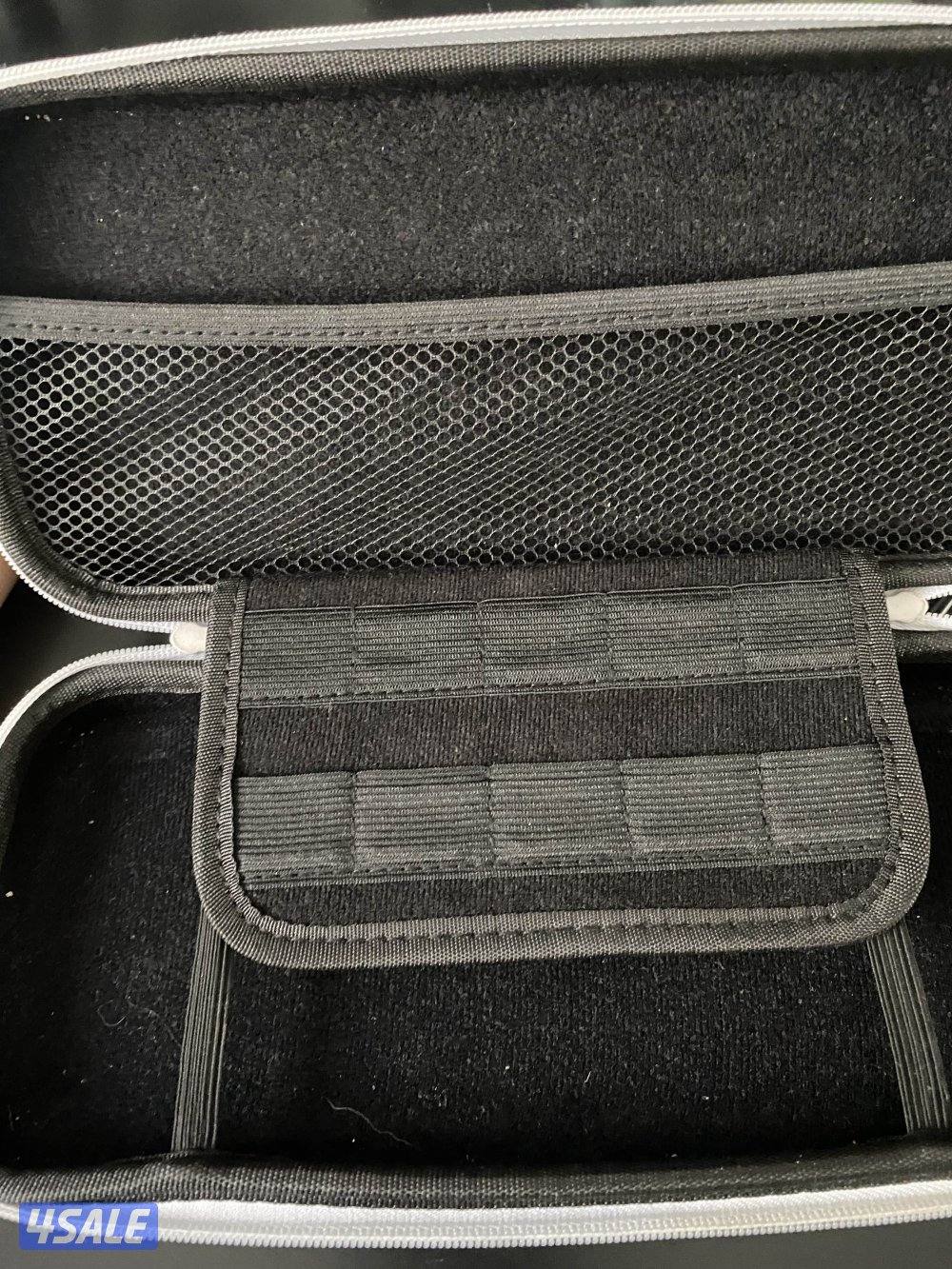 Nintendo Switch OLED Neon + 4 Games + Case – Excellent Condition8