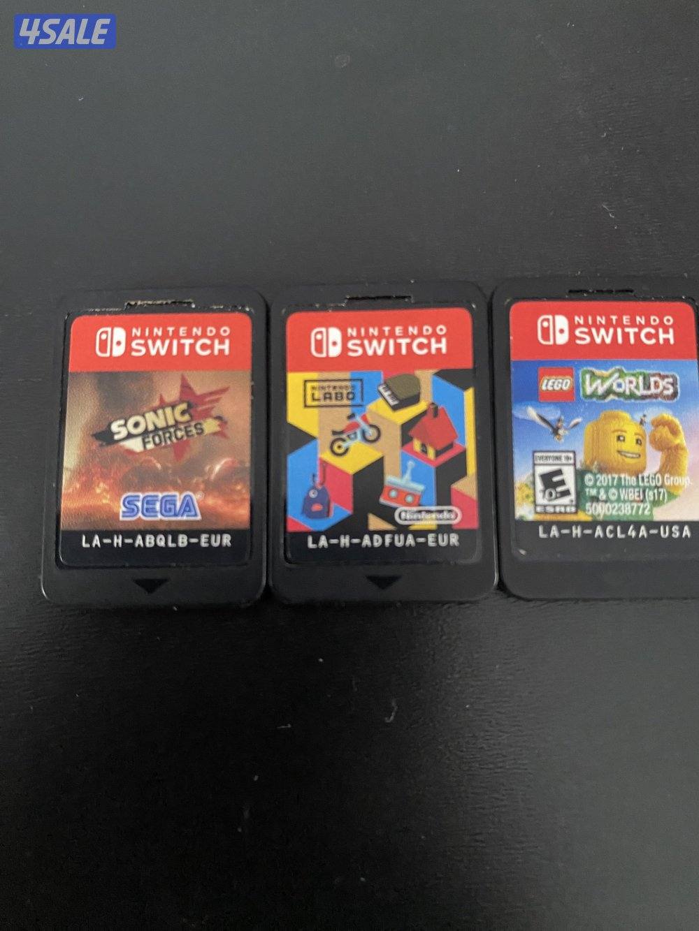 Nintendo Switch OLED Neon + 4 Games + Case – Excellent Condition9