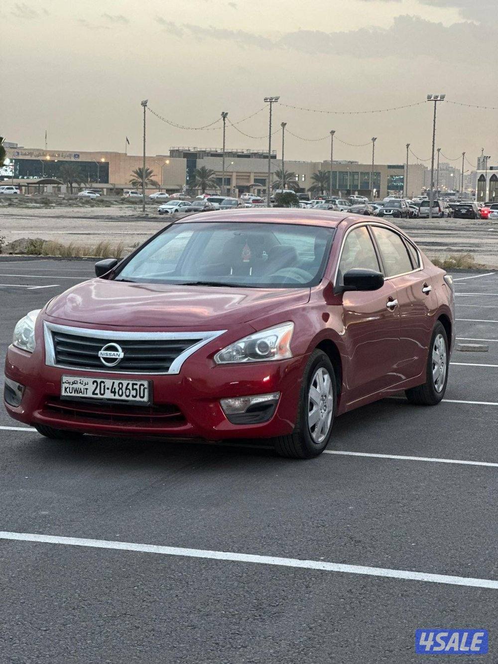 نيسان التيما 2013 عنابي عداد 164 الف بحاله ممتازة0