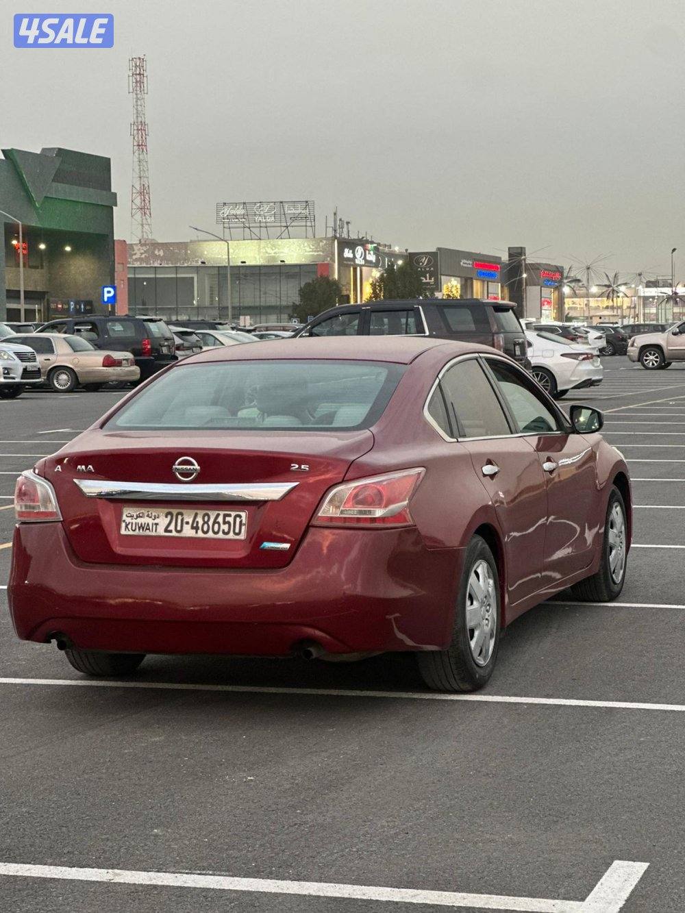 نيسان التيما 2013 عنابي عداد 164 الف بحاله ممتازة2