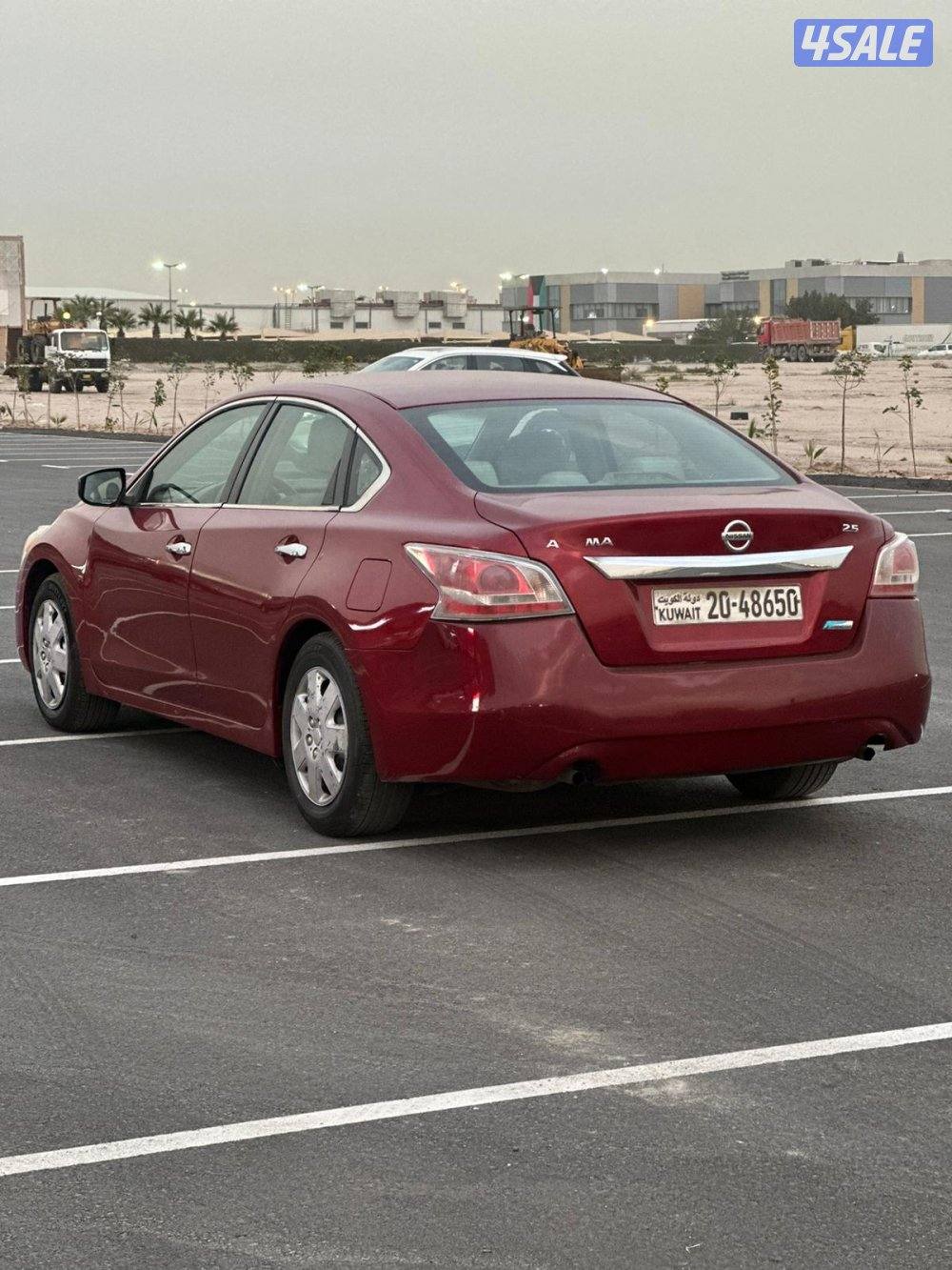 نيسان التيما 2013 عنابي عداد 164 الف بحاله ممتازة3