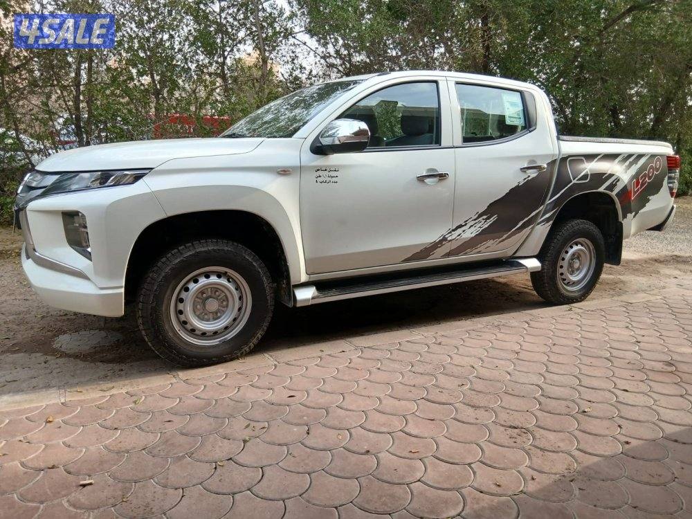 ميتسوبيشي2020/L200عداد22 الف وارد الوكاله قير عادي  دبل قير0