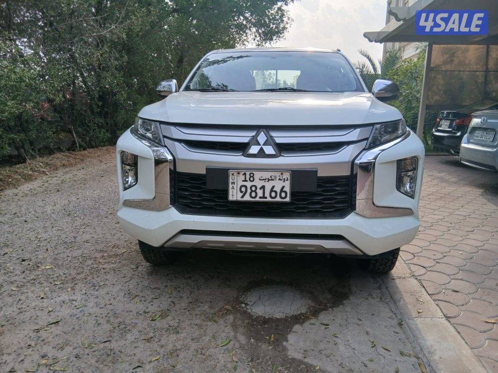 ميتسوبيشي2020/L200عداد22 الف وارد الوكاله قير عادي  دبل قير1