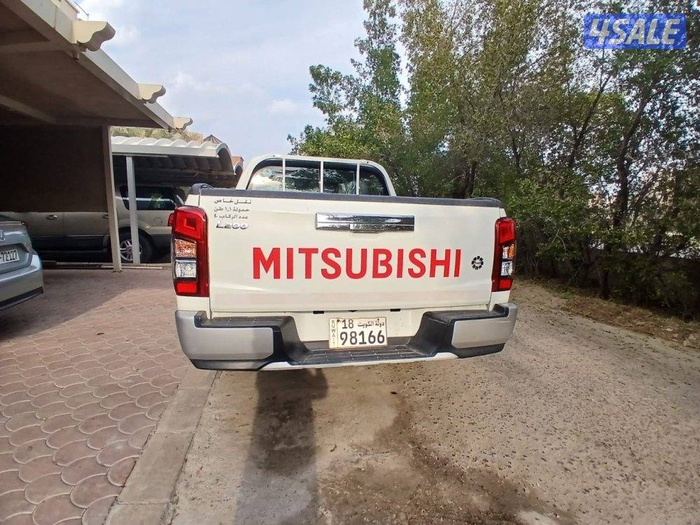 ميتسوبيشي2020/L200عداد22 الف وارد الوكاله قير عادي  دبل قير4