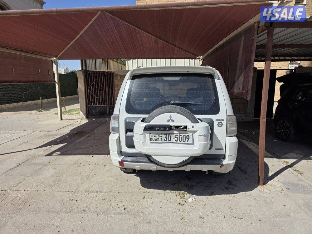 باجيرو 2014 - أبيض - مكينه كبيرة - شرط الفحص - مكينة وقير وشاصي1