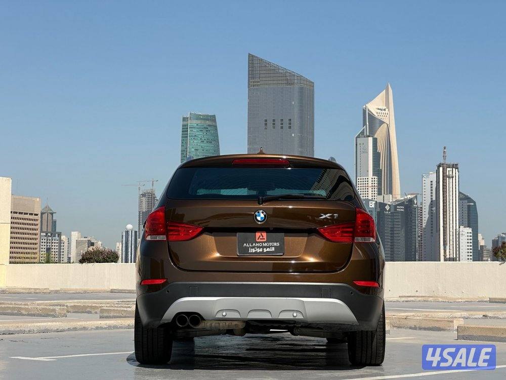 بي ام دبليوX1 موديل2015 عداد139الف وارد امريكا ملف +سيرفس في الغانم3