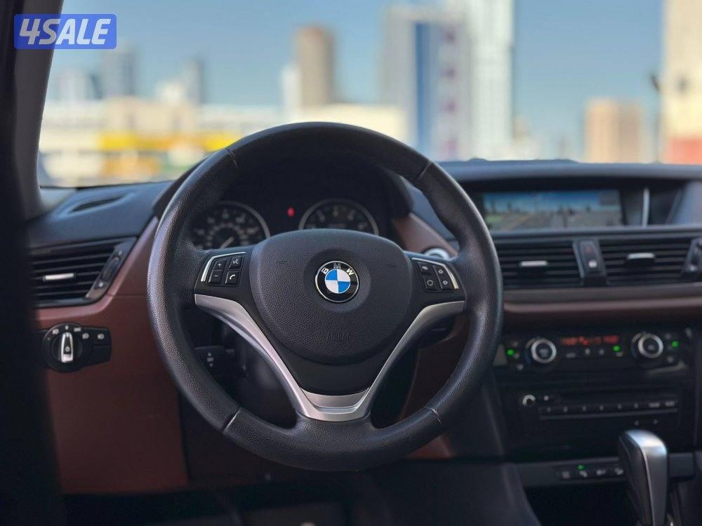 بي ام دبليوX1 موديل2015 عداد139الف وارد امريكا ملف +سيرفس في الغانم6