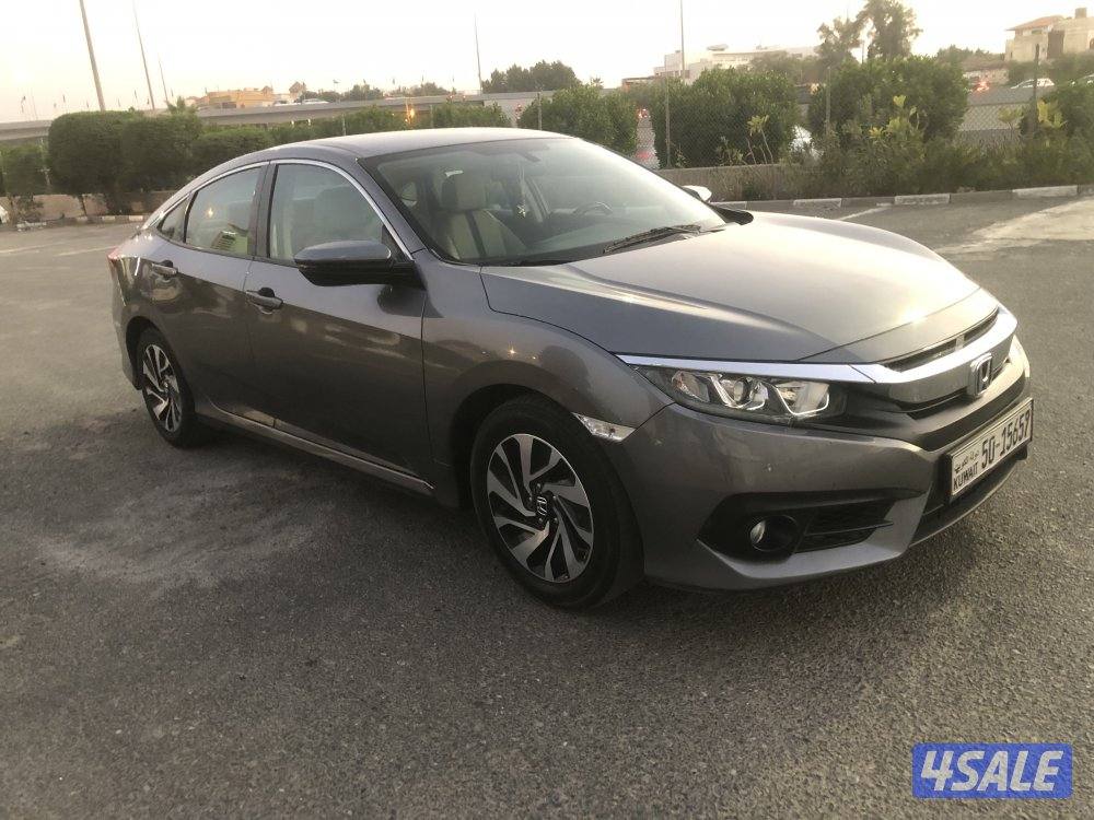 ماشي 102 بحالة نادرة قمة بالنظافة موديل 2017 اللون رمادي من داخل بيج2