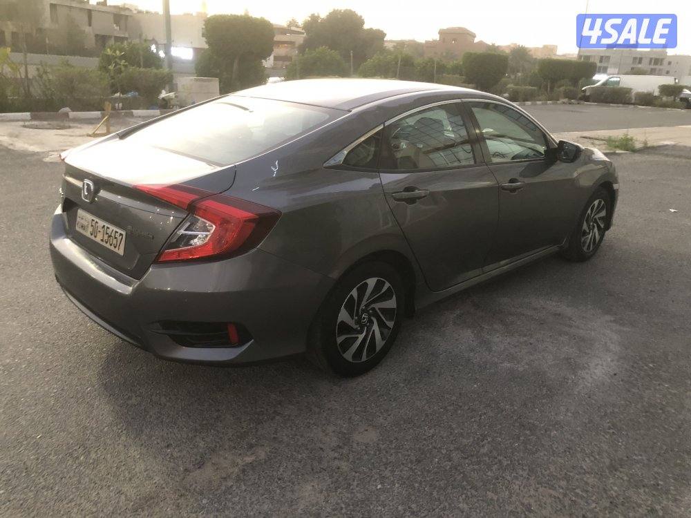 ماشي 102 بحالة نادرة قمة بالنظافة موديل 2017 اللون رمادي من داخل بيج3