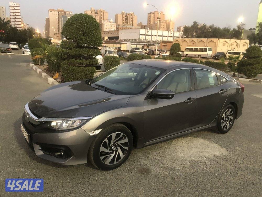 ماشي 102 بحالة نادرة قمة بالنظافة موديل 2017 اللون رمادي من داخل بيج12