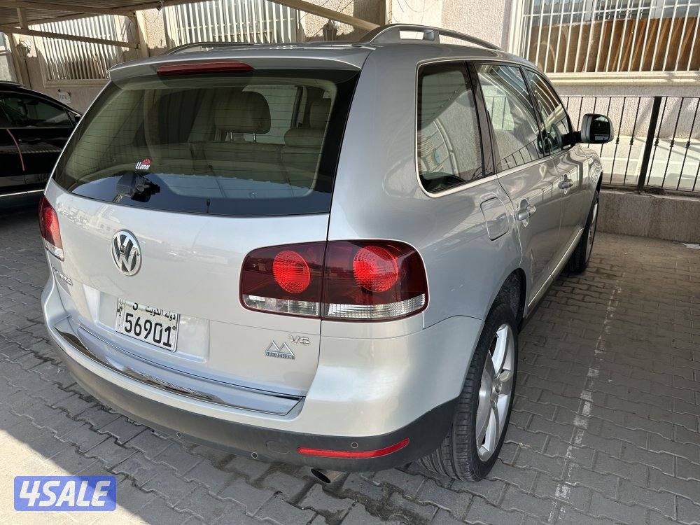 فولكس طوارق صبغ الوكاله موديل 2009 ماشي 192 الف فقط كامل المواصفات3